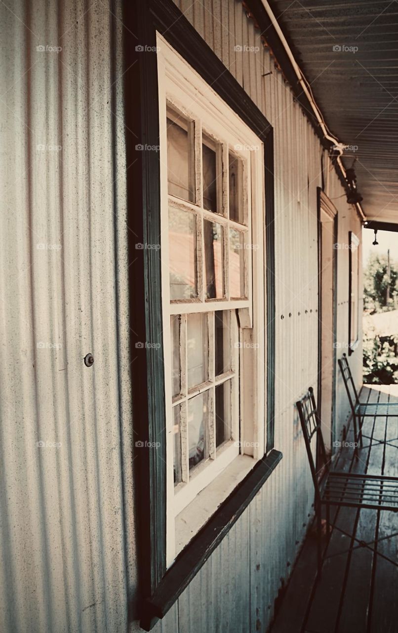 Beautiful facade and windows of a wooden house