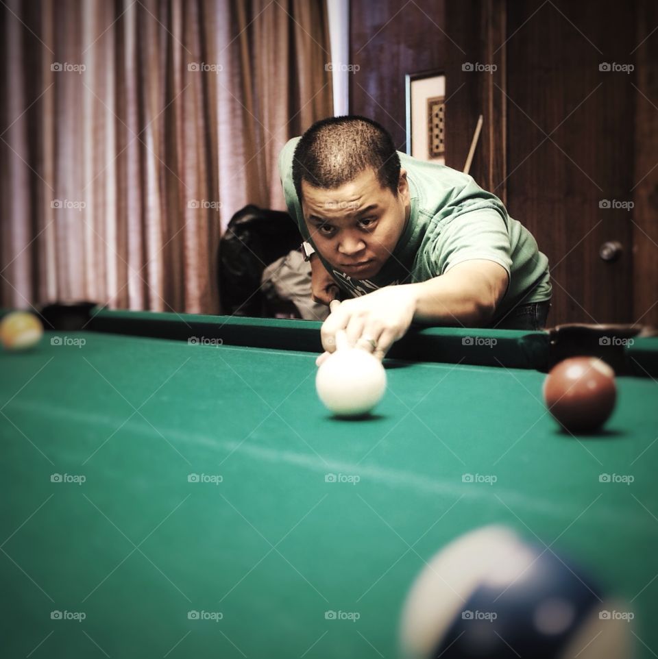 Friend, shooting pool