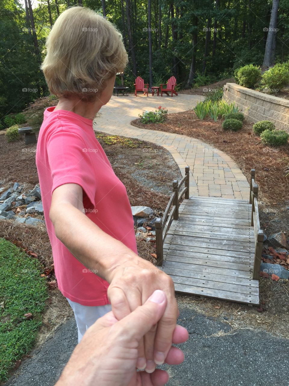 Holding hand over bridge