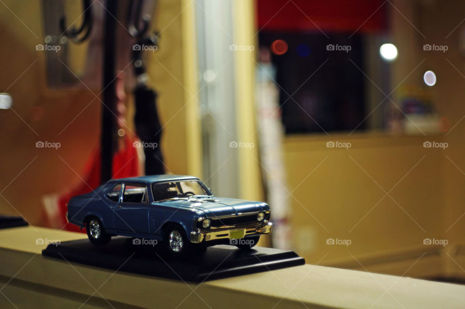 Model classic car in window