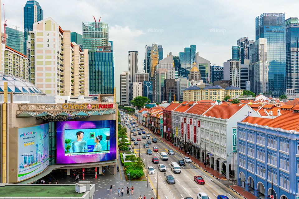 Old shophouses vs modern skyscrappers