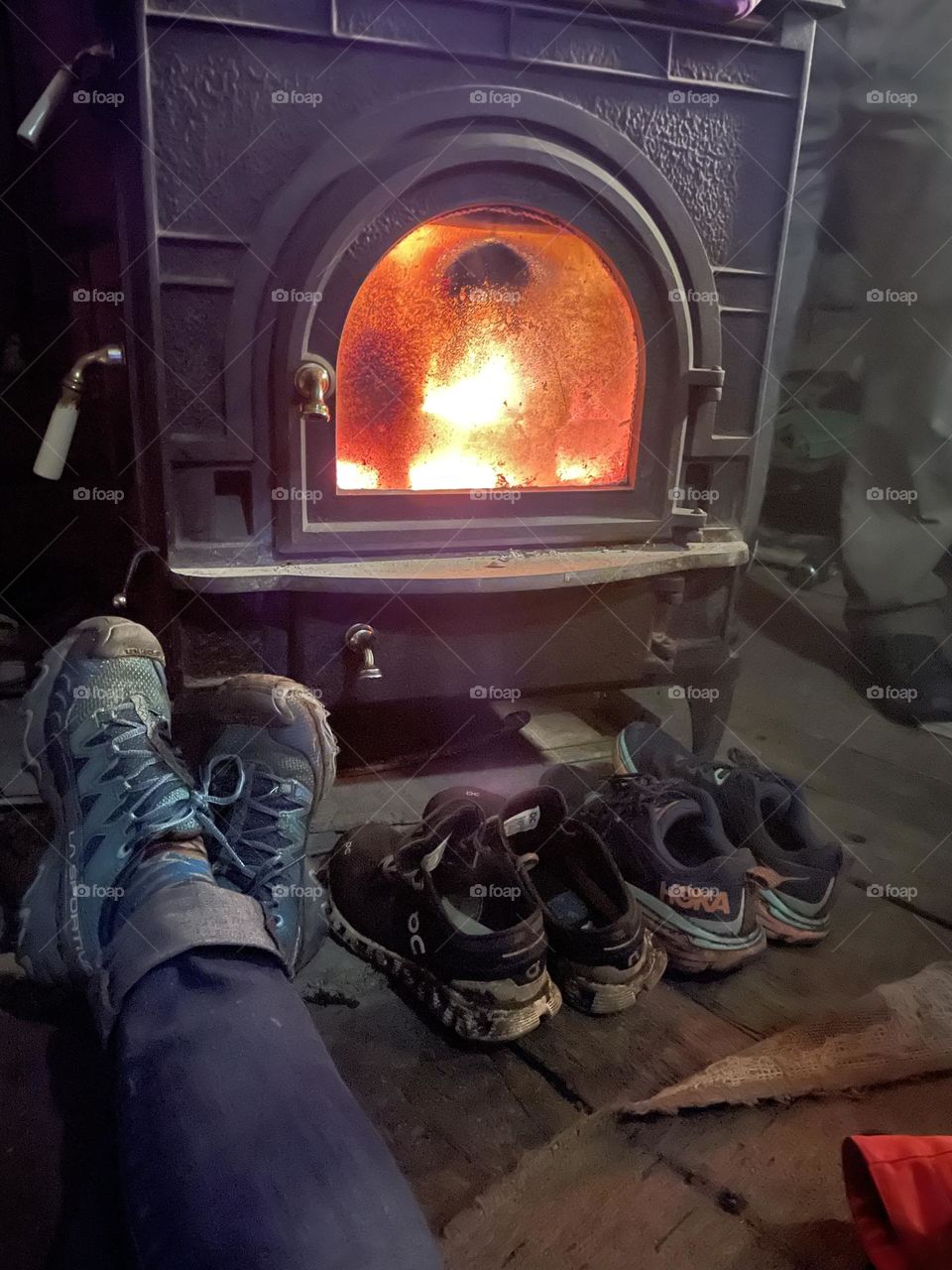 Keeping warm by the fire. What a group of fantastic shoes too! LaSportiva, OnCloud, Hoka 