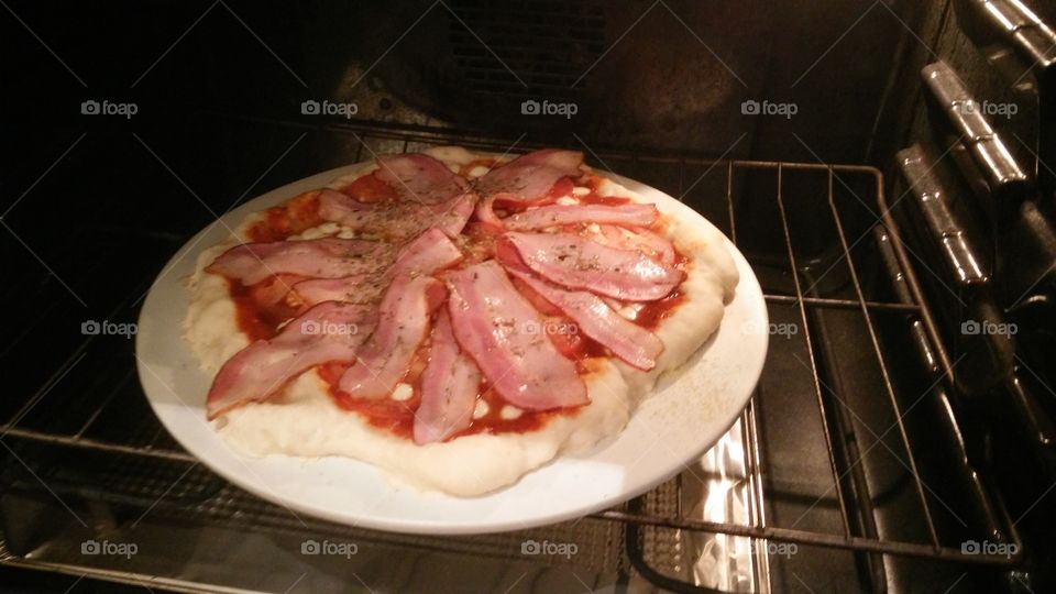 baptise my pizza stone with homemade pizza,  bacon tomato slice bocconcini oregano