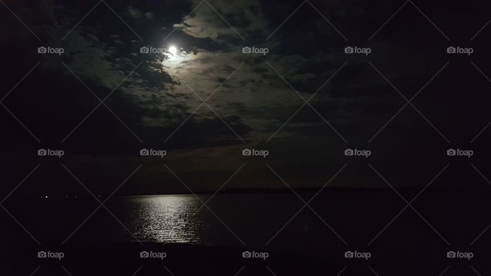 full moon rising over Lake Summerville State Park Texas