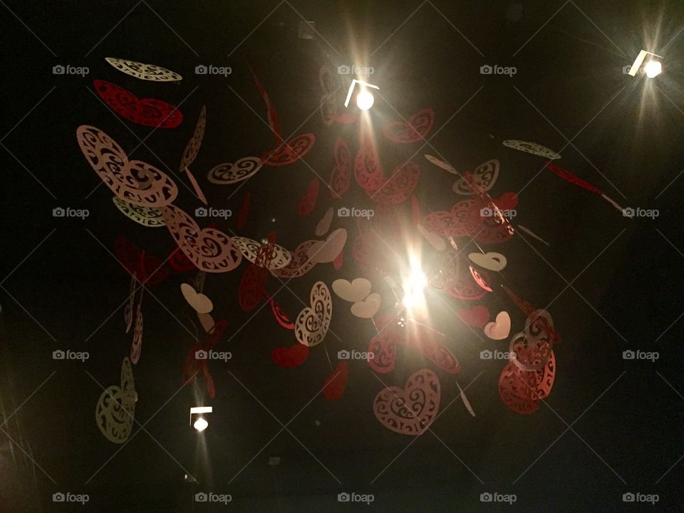 Heart decorations in the restaurant at the ceiling 