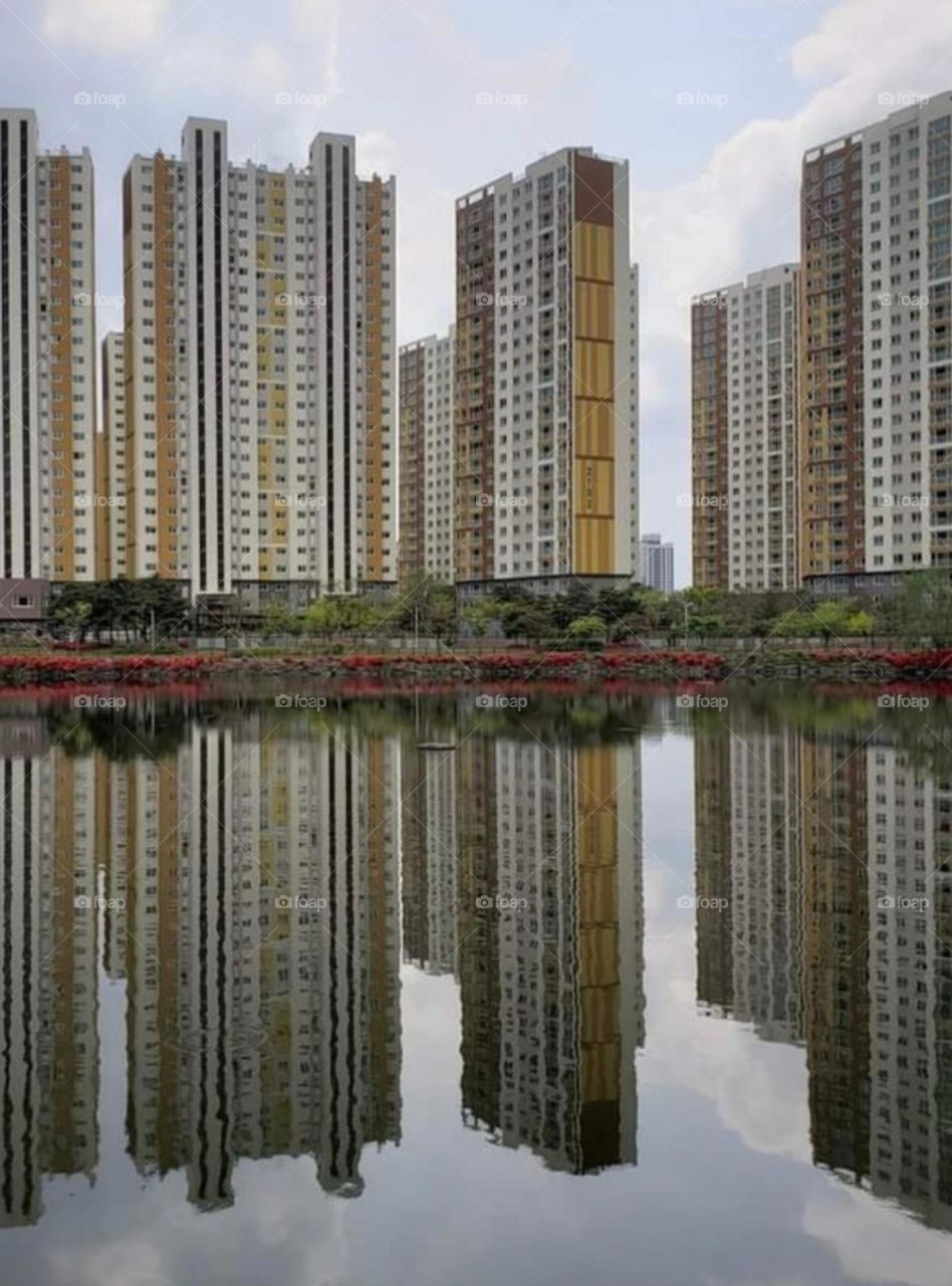 Chinese City Buildings reflected in water