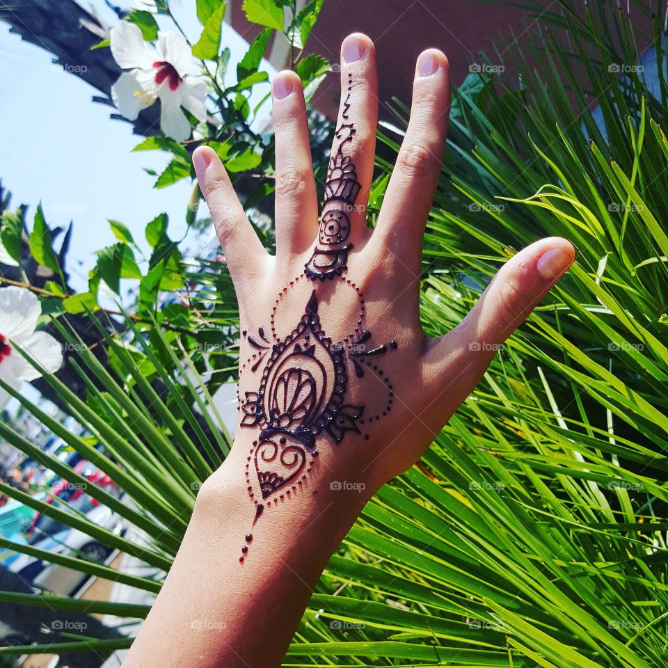 beautiful hand design with tropical background