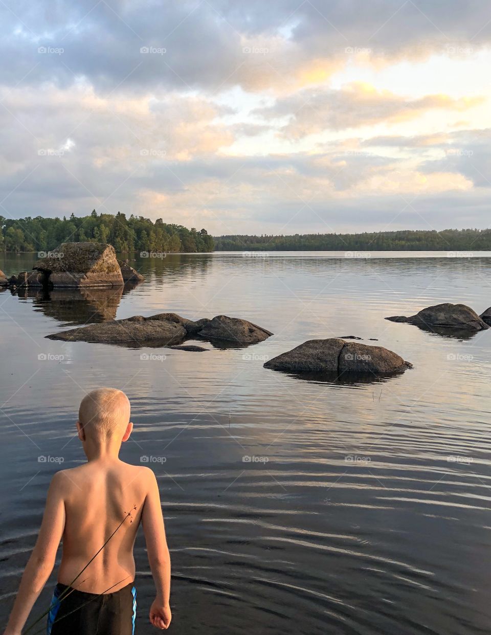 Kid at the lake