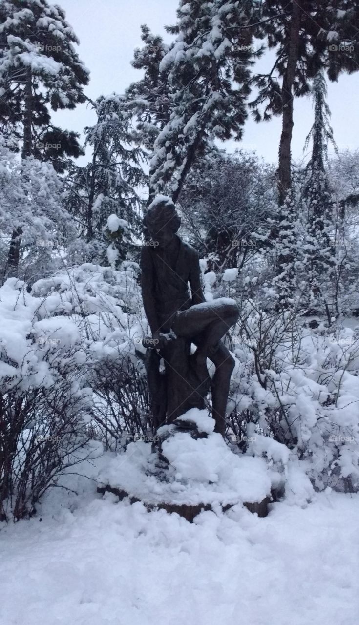 Statue in a Winter Wonderland NYC Park