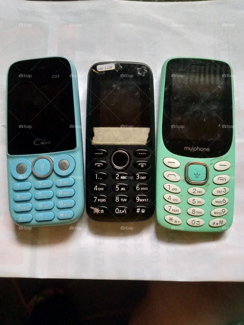 OLD MODEL KEYPAD CELFONS,, STILL USED THESE DAYS, FOR SELLING PREPAID LOADS