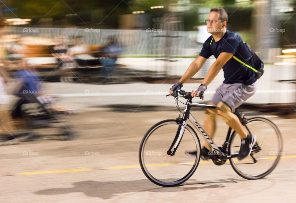 Young Man On Bike Ride In The City
