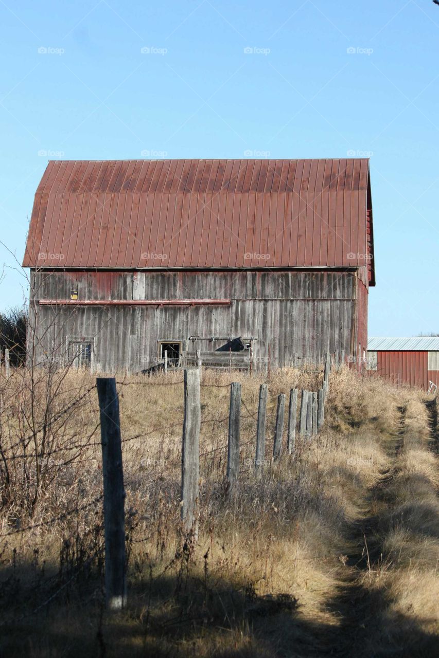 Old barn with fence