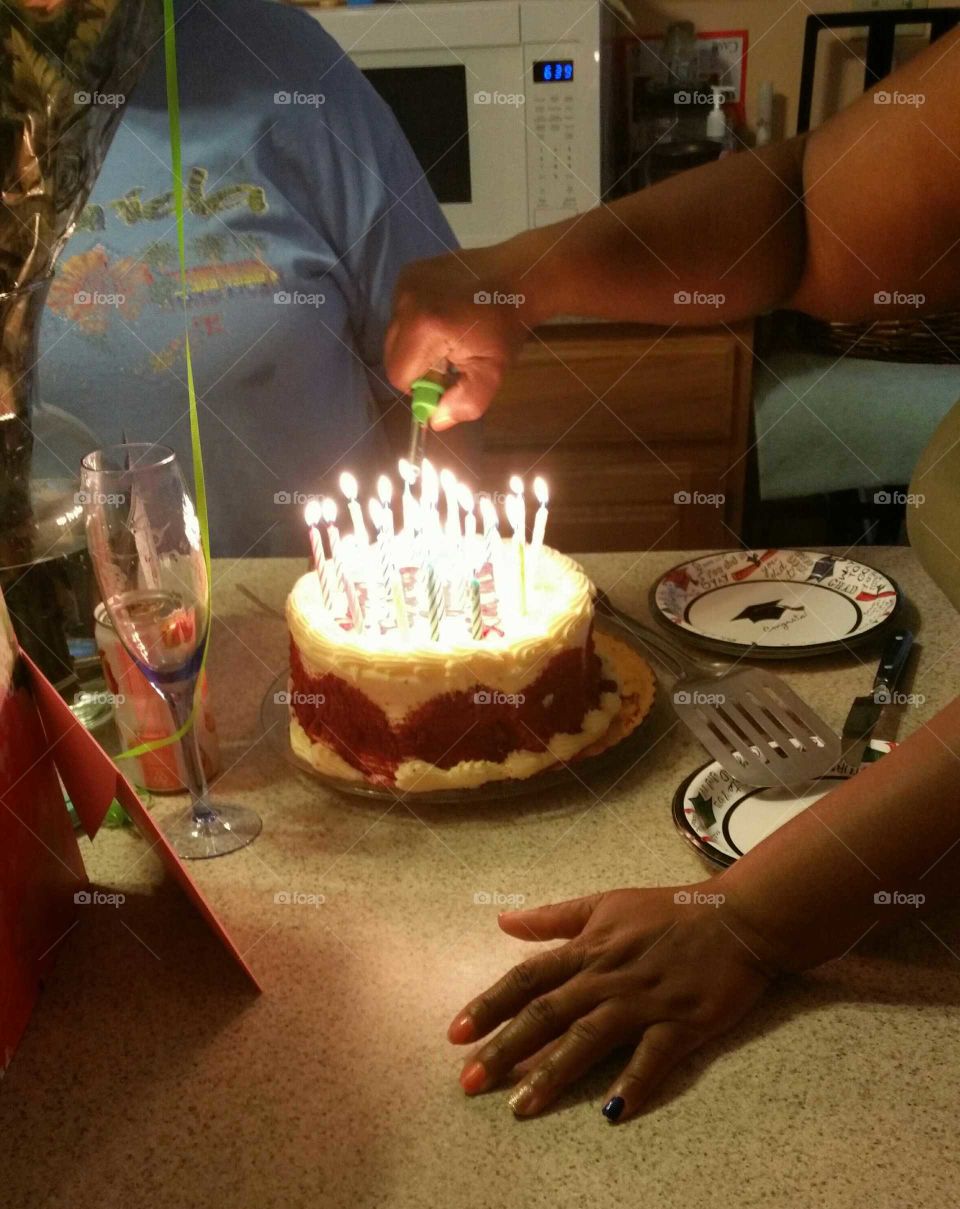 lighting the birthday cake
