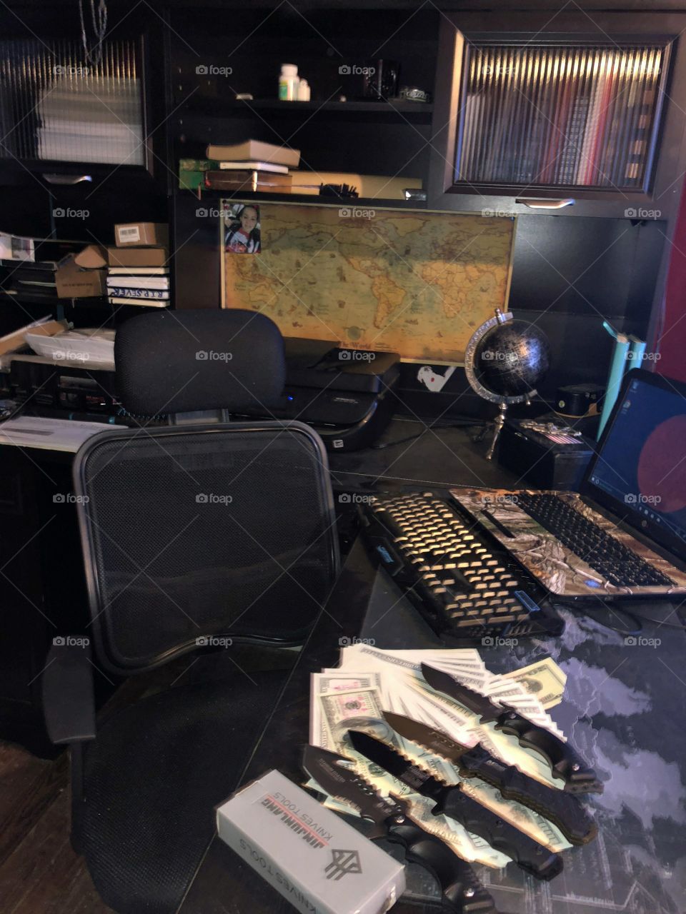 Work station of a knife collector and dealer! My favorite place to be to work, write, organize my coin collection and just about everything else I hold close to my heart. 