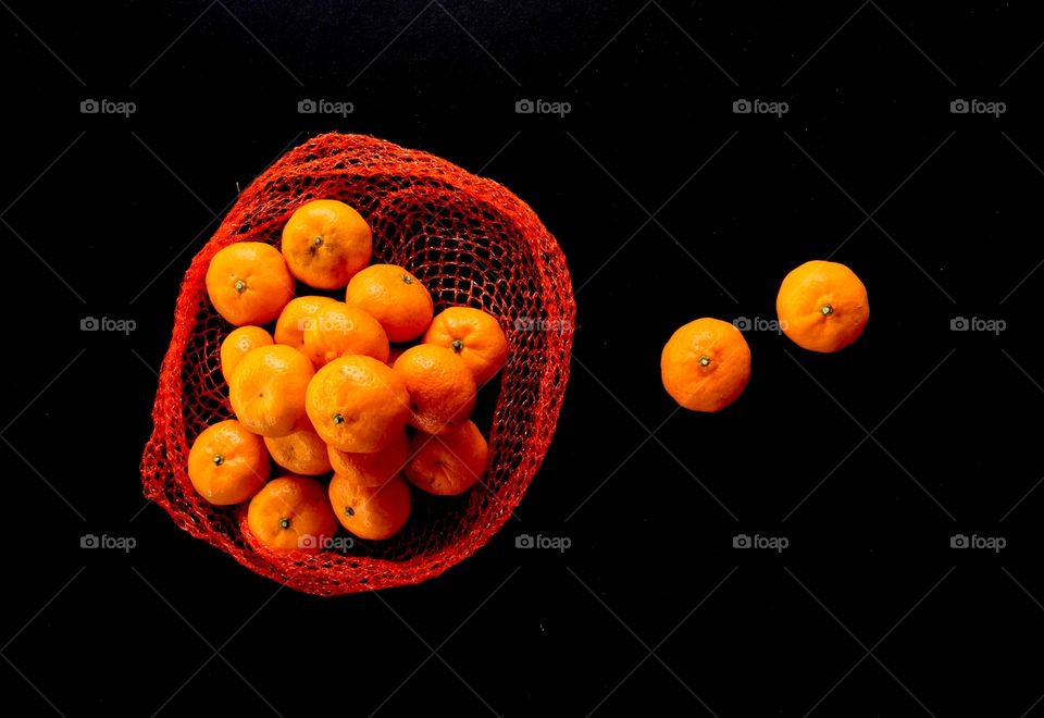 Oranges in black background