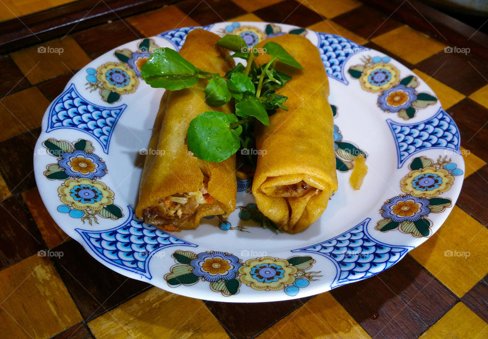 Close-up of spring rolls in plate