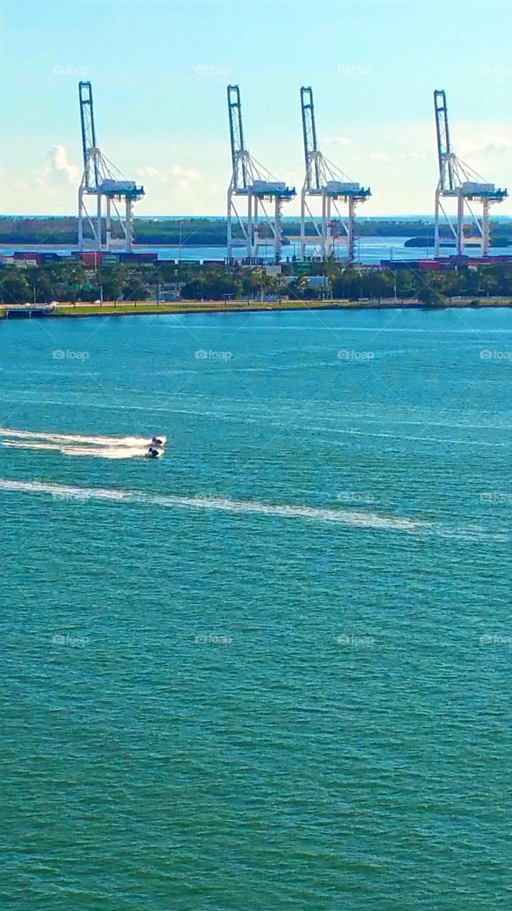 Jet skiers on the waterway