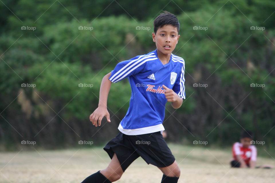 Young boy running