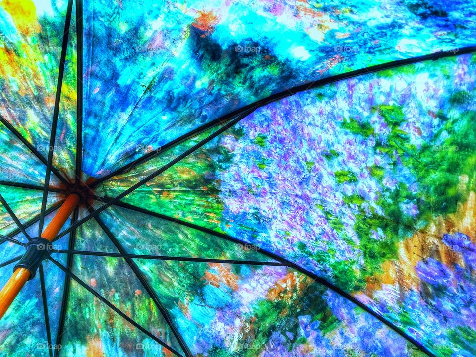 Brightly colored umbrella clash of color