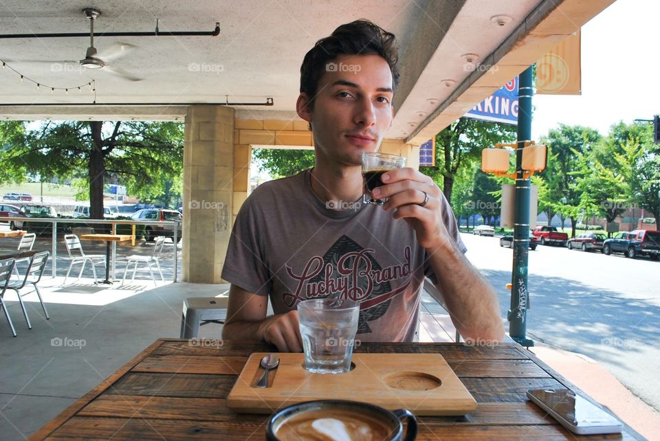 Young man drinking coffee