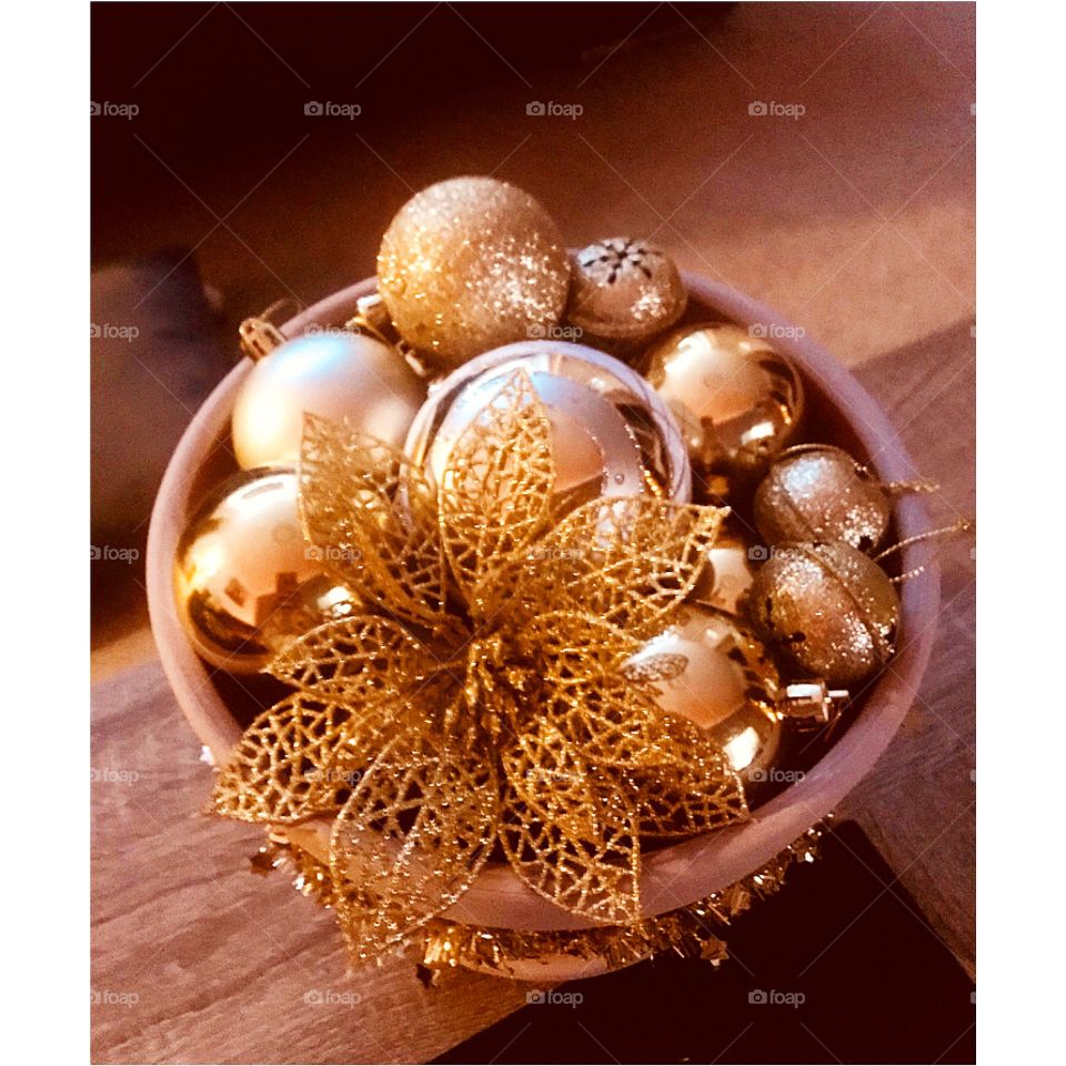 Handmade decorations for the Christmas season. Lovely colours of gold and golden glitter. 