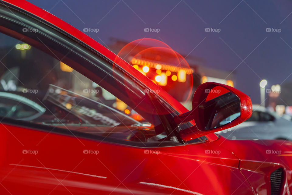 Red luxury car, closeup view