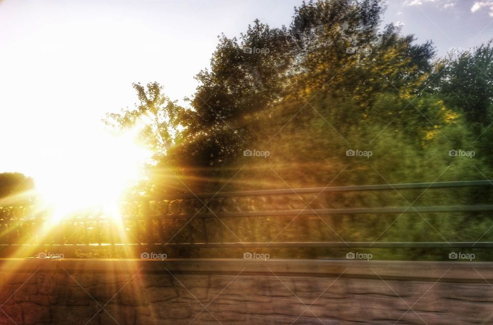 Sunset Over the River's Bridge