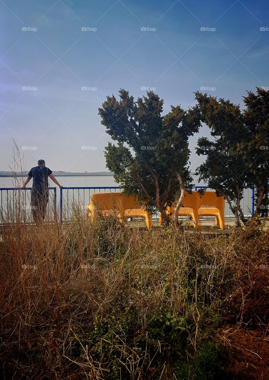 man on the riverside