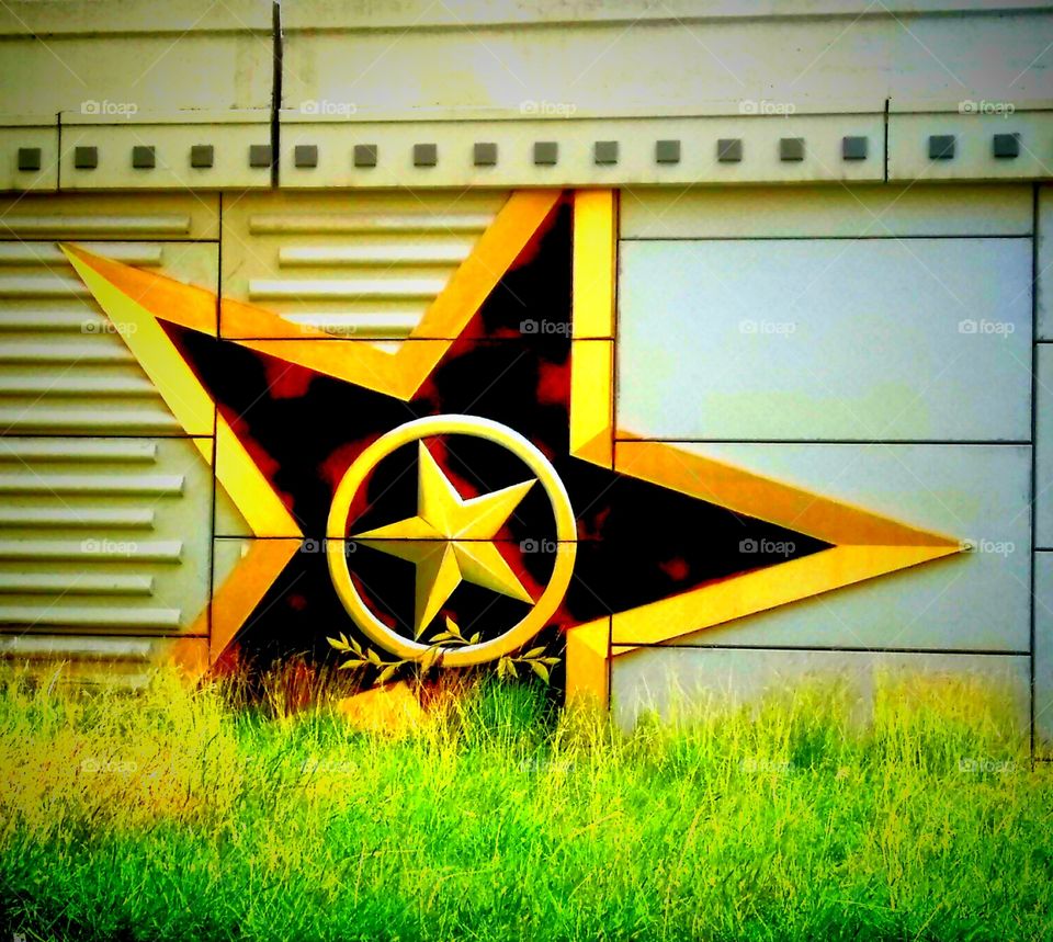 Texas Highways Iconic Star surrounded by Gold in the Lone Star State Beltway 8 on the Road again