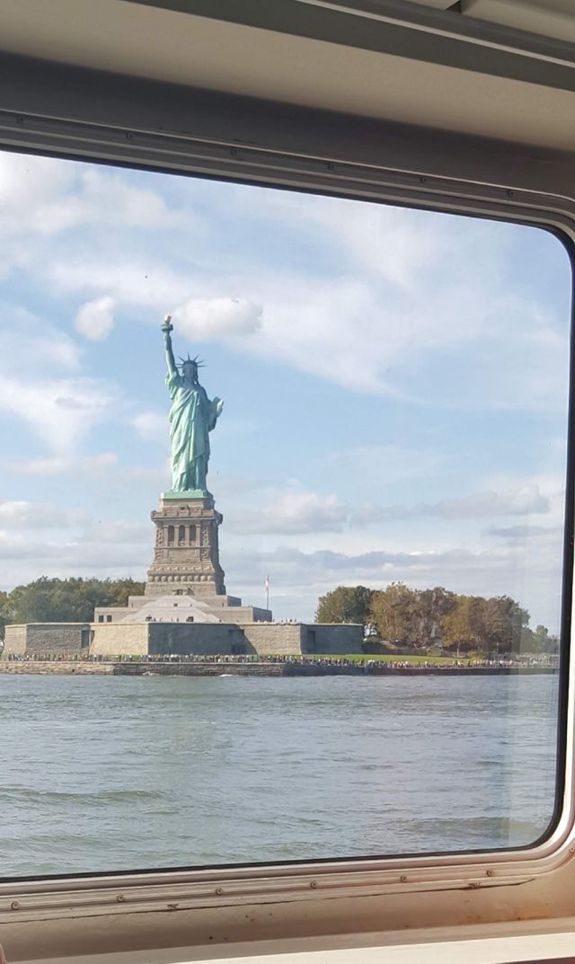 Statue of liberty from the boat cruise New York