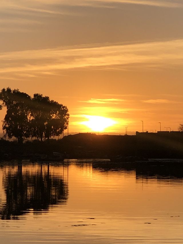 Late afternoon reflected in the river