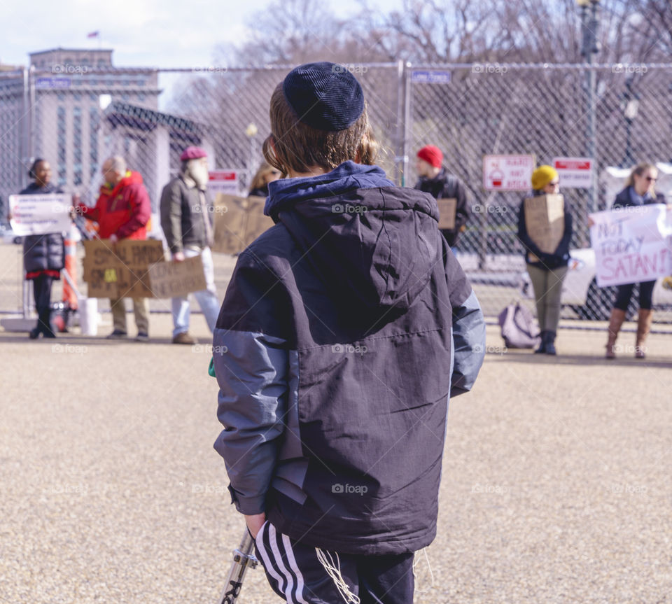 Jewish Child  observes Protest 