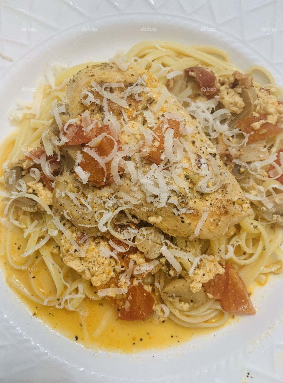 Chicken with mushrooms in tomato cream sauce 