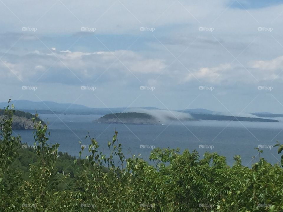 Fog rolling over the islands. Bar Harbor, Maine