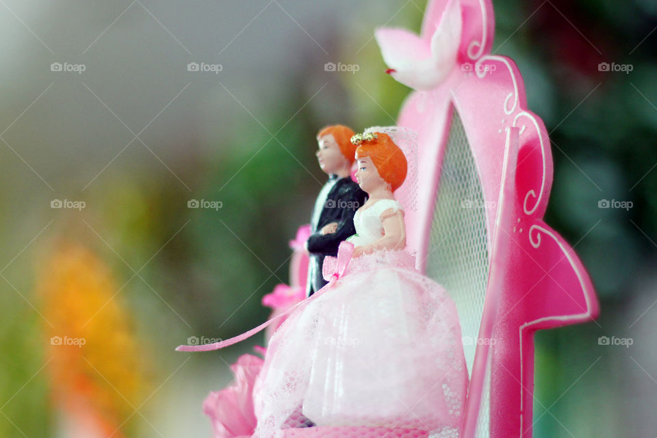 Wedding cake doll photography for advertising high quality and special on foap. Donate to us by buying this picture. Thank You and Happy Wedding.