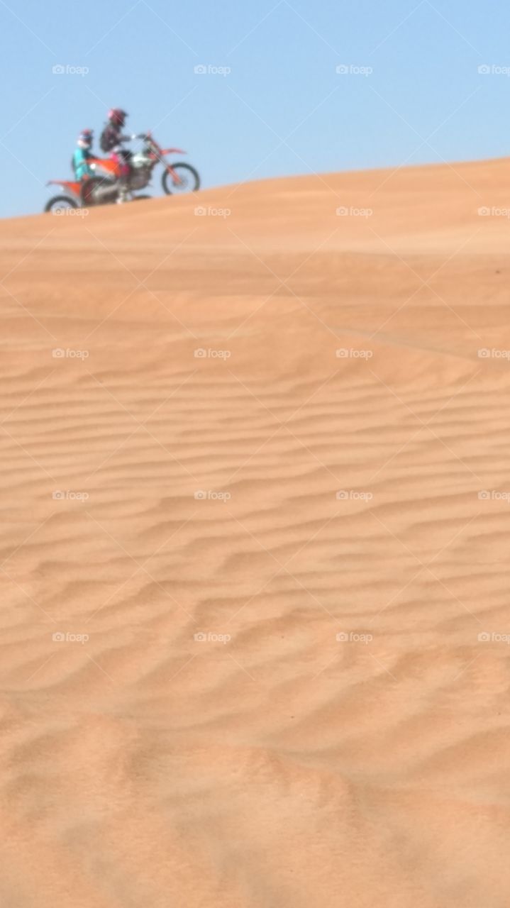 Motor cycle Racing in Desert