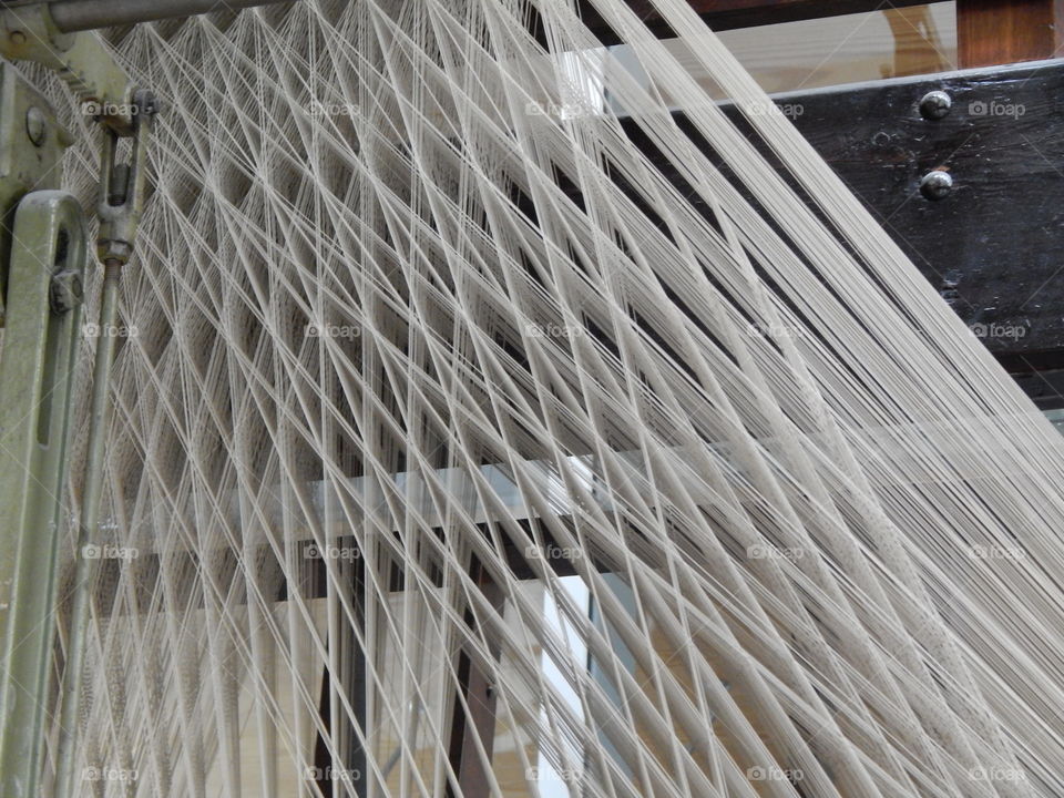 threads in a weaving machine