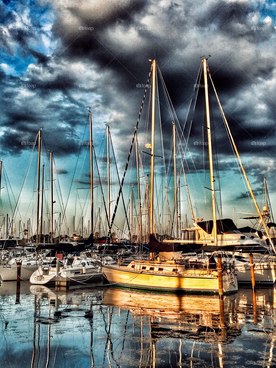 Storm clouds over FL marina. 