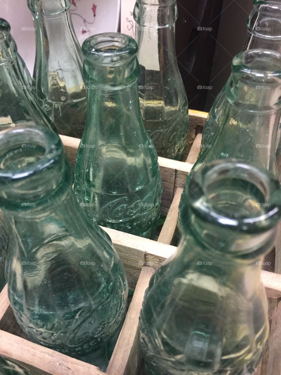 Old green glass coke bottles 