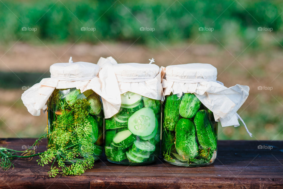 Pickled cucumbers. Pickled cucumbers made with home garden vegetables and herbs