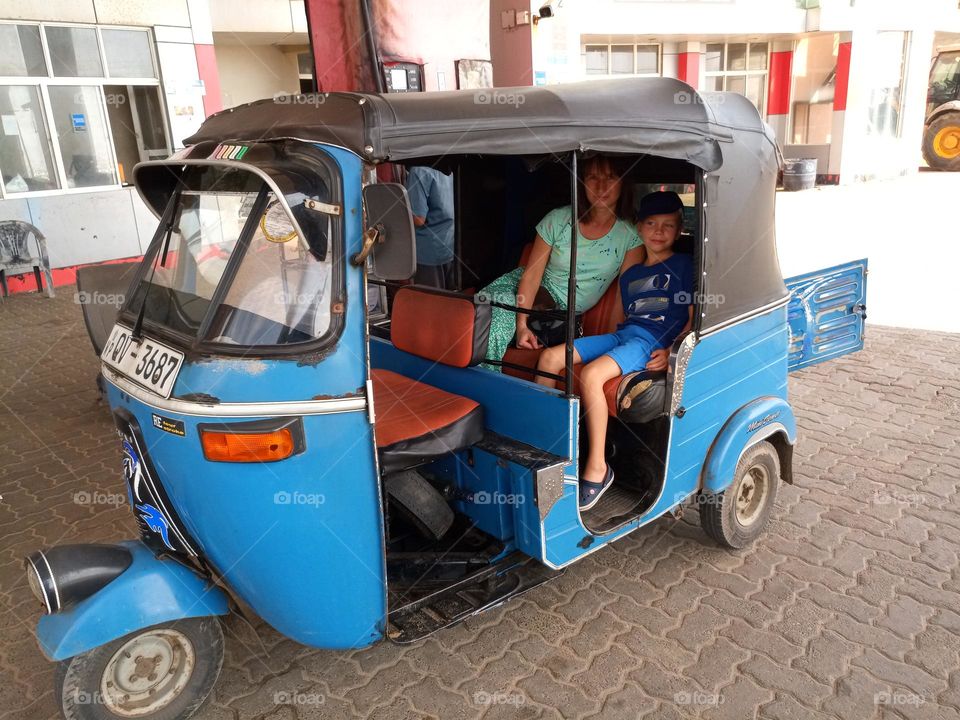 Travel by tuk tuk