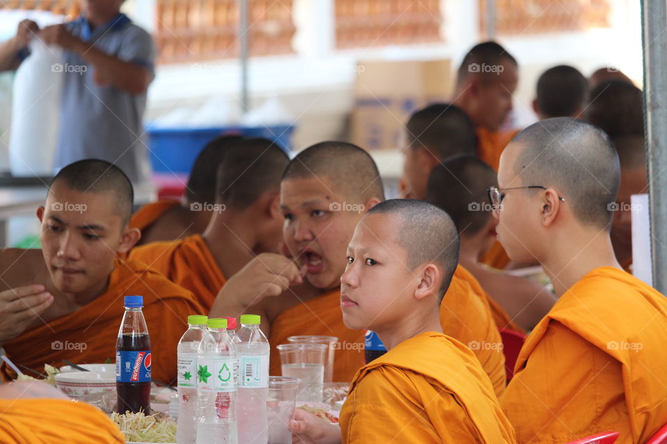 Monks eating meal at Wat Chaimongkron Royal Monastery- Pattaya Thailand 