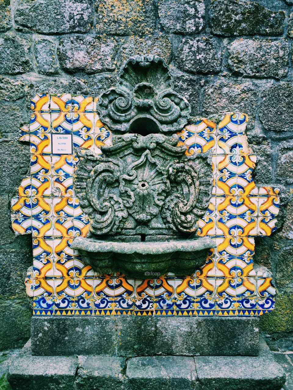 Famous Portuguese tiles - azulejos - on in an old and half-destroyed noble house in Barcelos 
