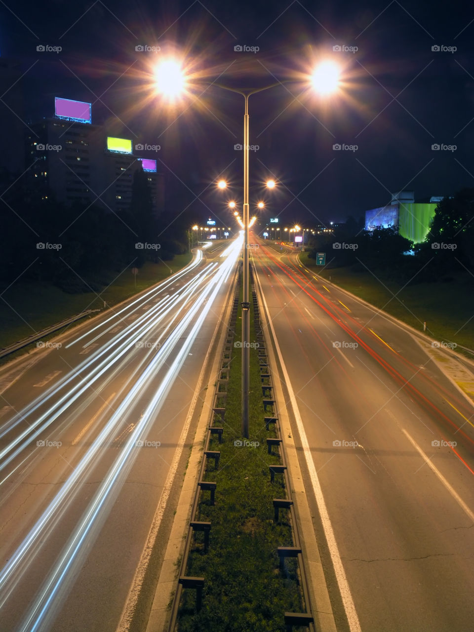 Time lapse and exposure overlay on the highway median