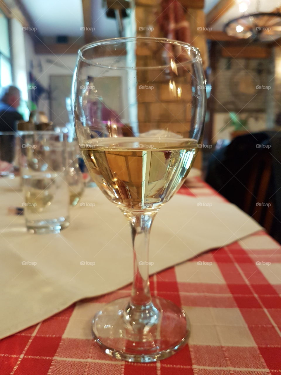 glass of white wine in the restaurant