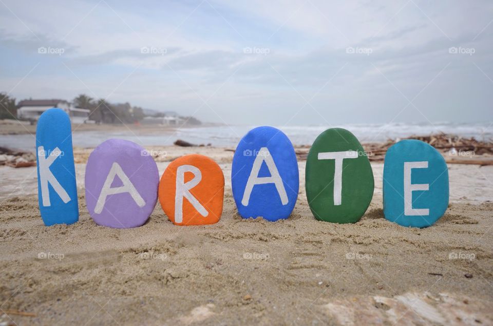 Karate, martial art concept on colourful stones