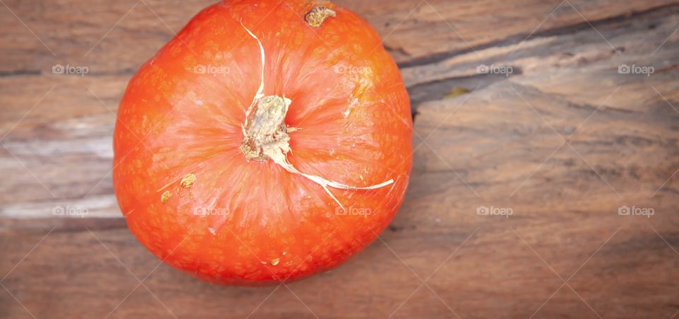 Pumpkin on Rustic background on daylight 