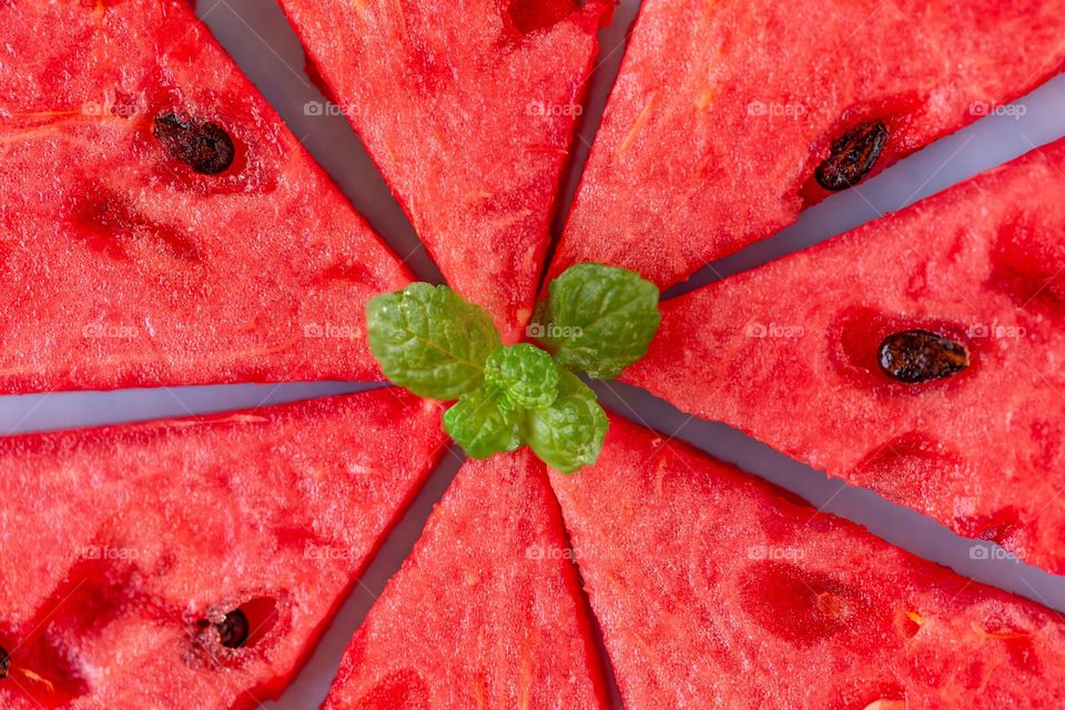 Delicious sweet watermelon slices with fresh mint, yummy summer treat