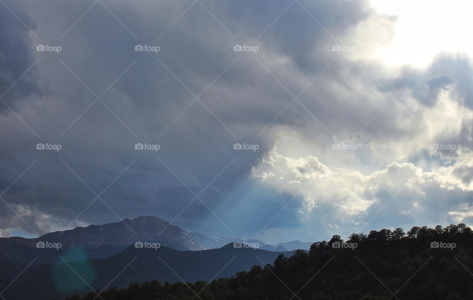 clouds mountains sunlight vista by billgoodwin