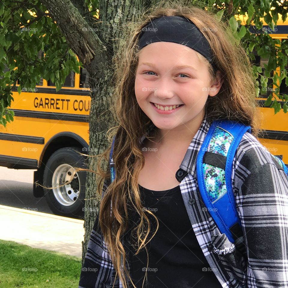 Teenager school girl looking at camera